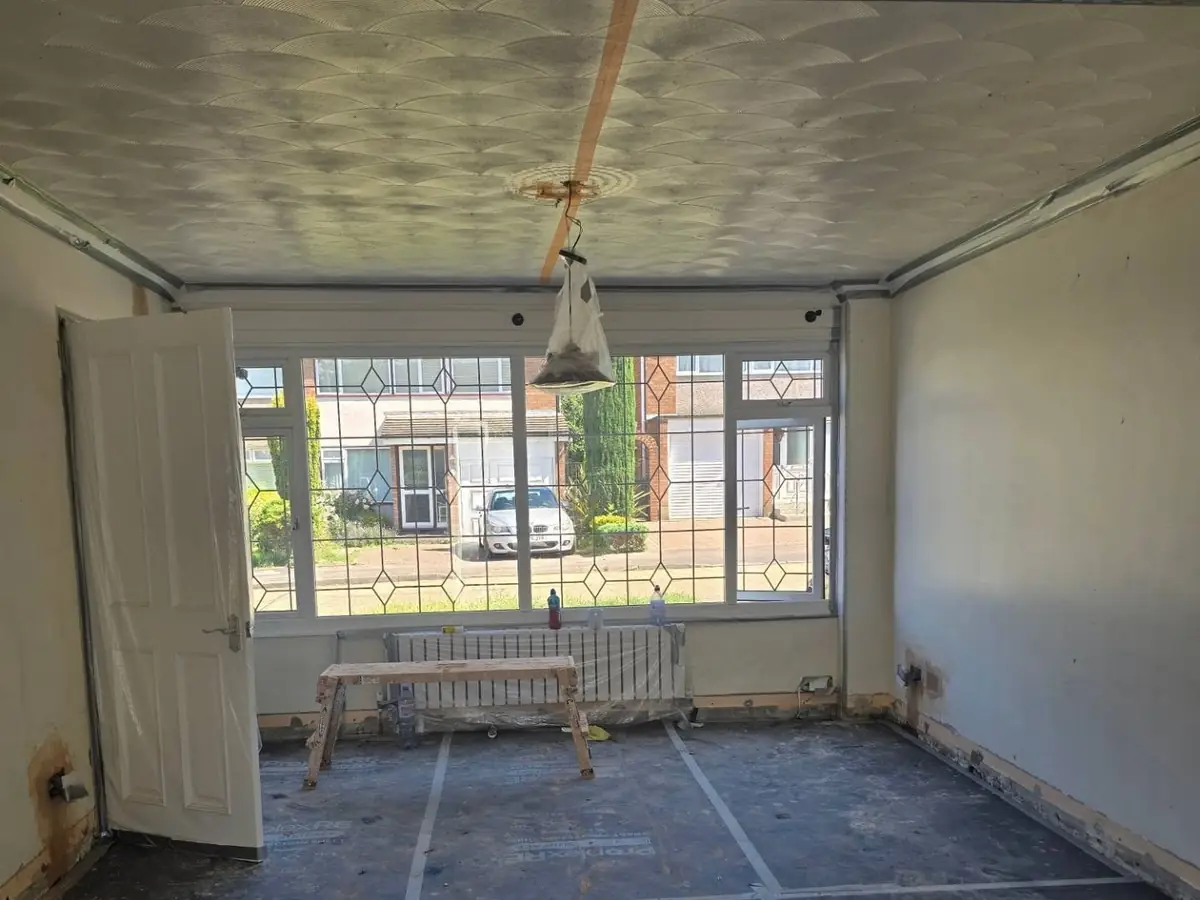 Large through room freshly plastered by ST Plastering & Rendering