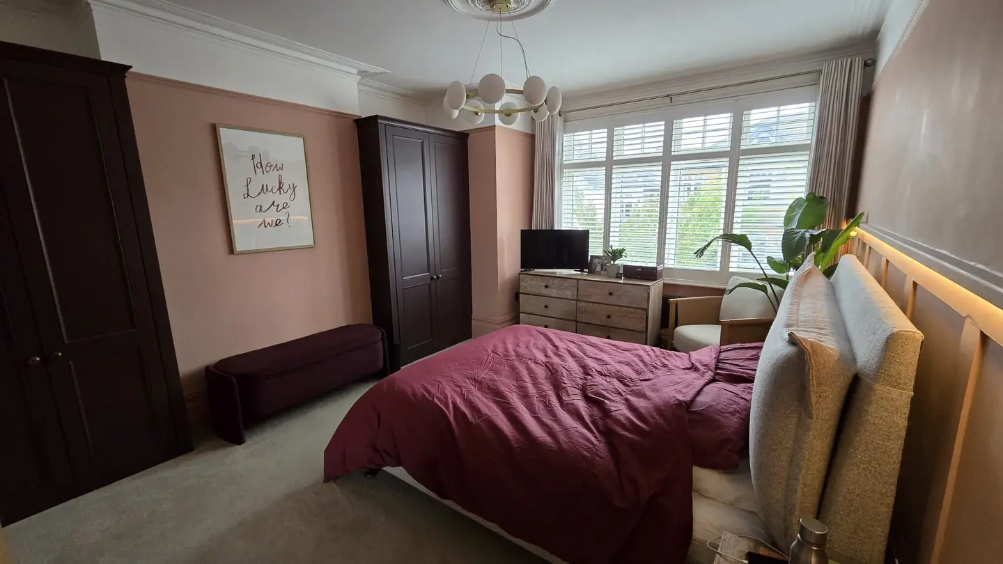 Bedroom plastered by ST Plastering & Rendering, photographed after decorating