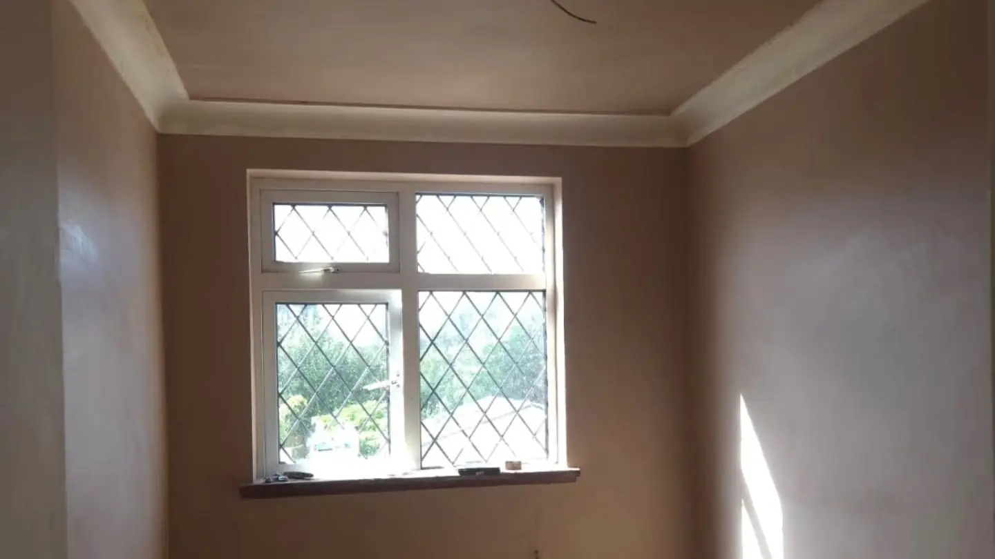 Bedroom replastered in Chingford by ST Plastering & Rendering