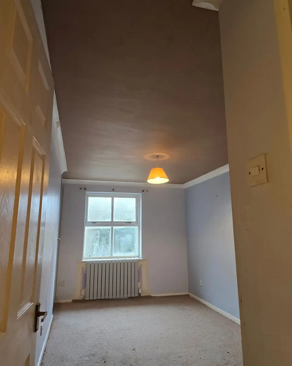 The same bedroom ceiling skimmed flat by ST Plastering & Rendering