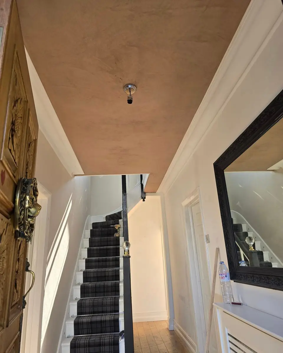 The same hallway ceiling skimmed smooth by ST Plastering & Rendering