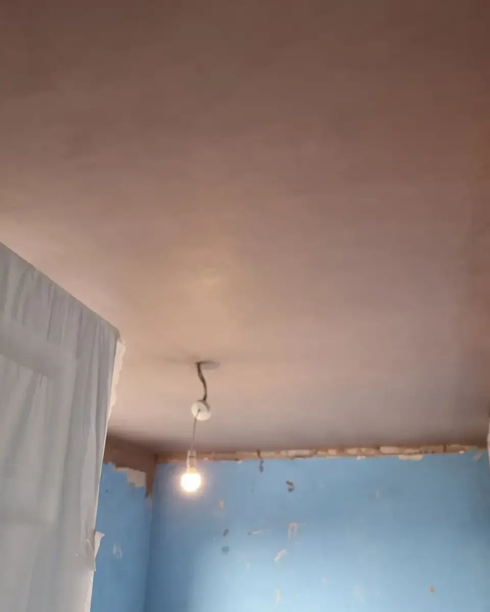 The same Woodford ceiling skimmed smooth by ST Plastering & Rendering