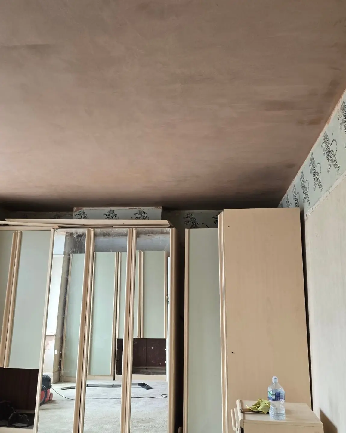 Ceiling boarded and skimmed in a stripped room, by ST Plastering & Rendering