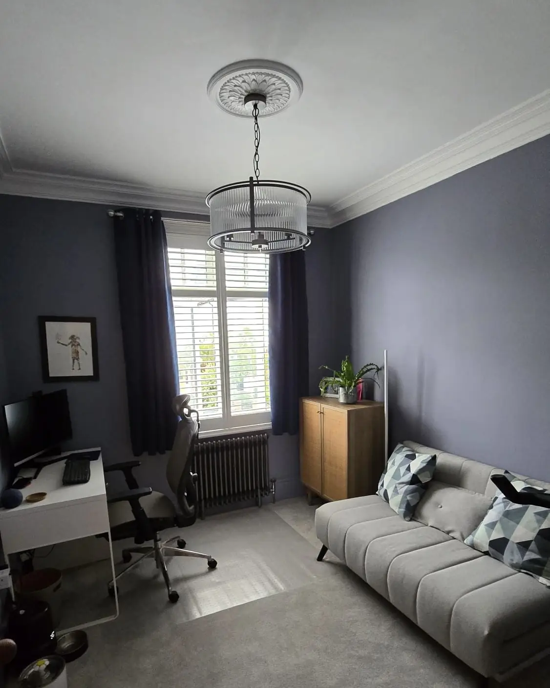 Small room skimmed round the ceiling rose, since decorated, by ST Plastering & Rendering