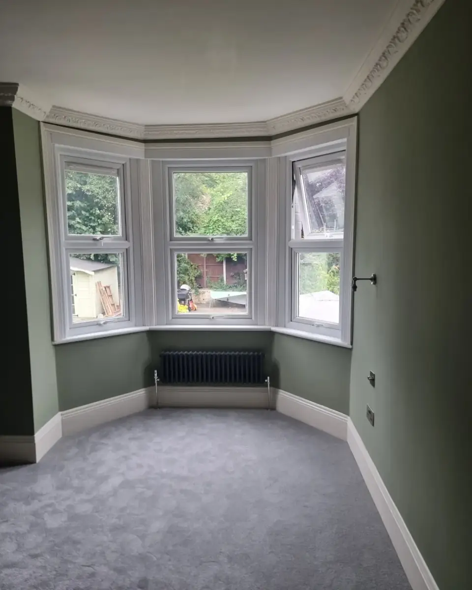 Bay window bedroom plastered and decorated, with ornate cornice, by ST Plastering & Rendering