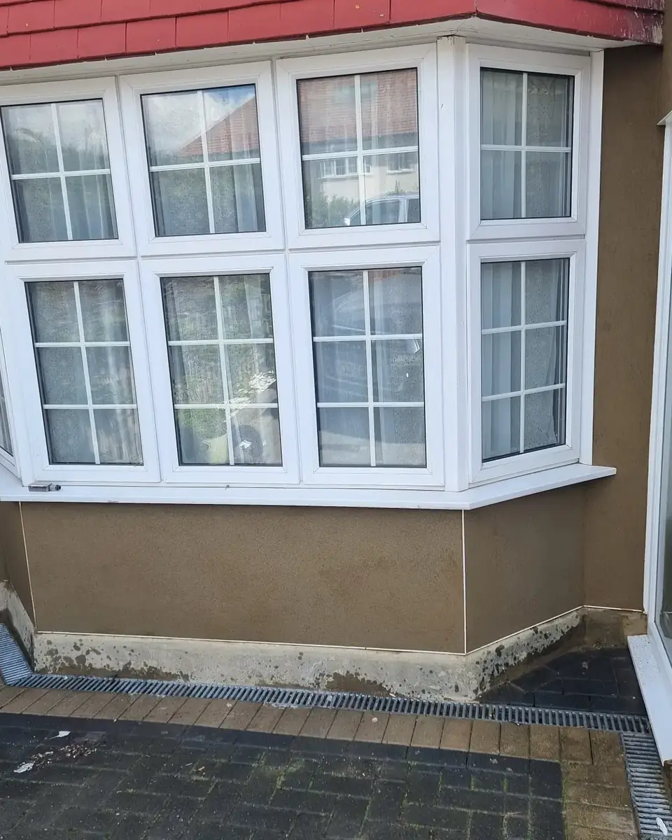 Bay window front rendered in sand and cement by ST Plastering & Rendering
