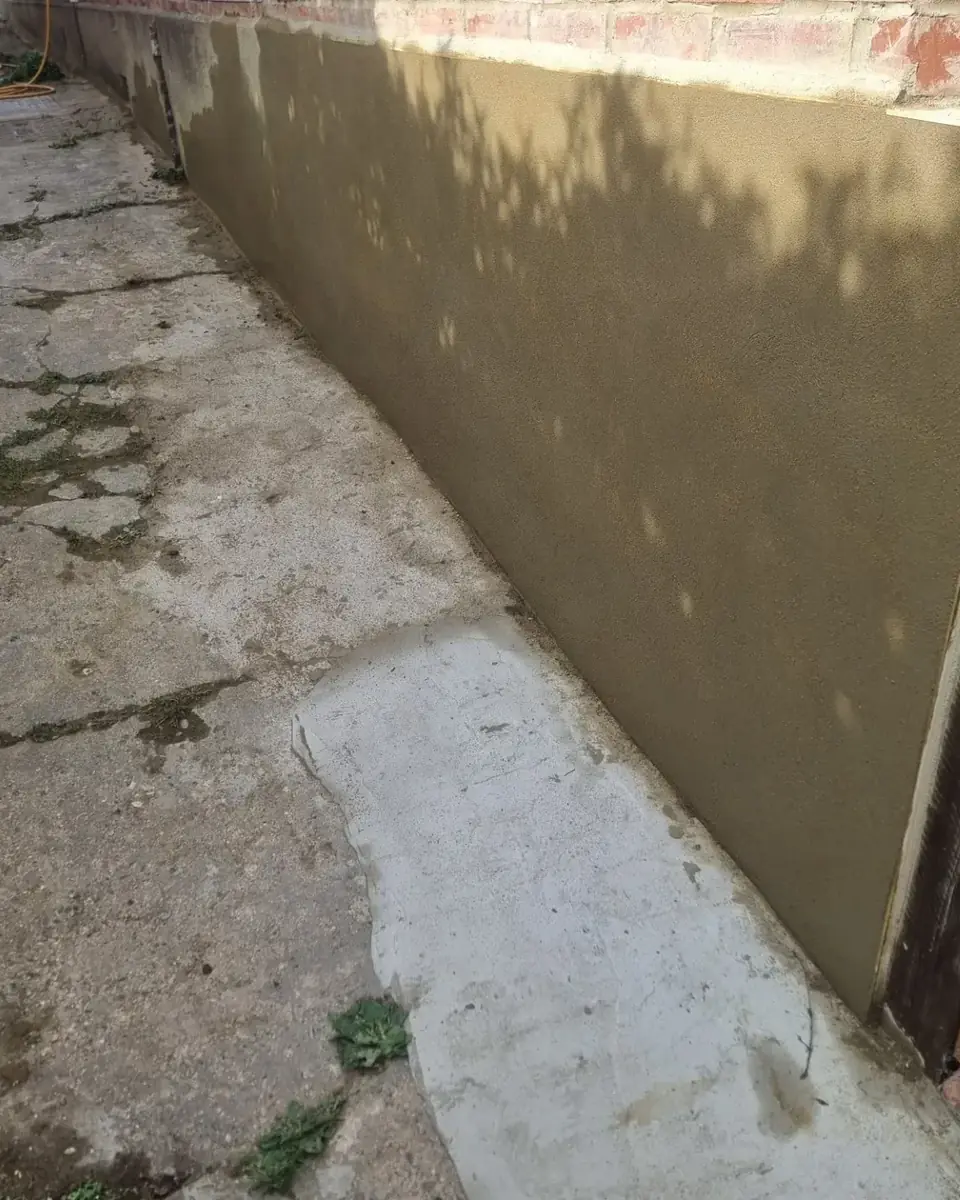 The same side wall rendered by ST Plastering & Rendering